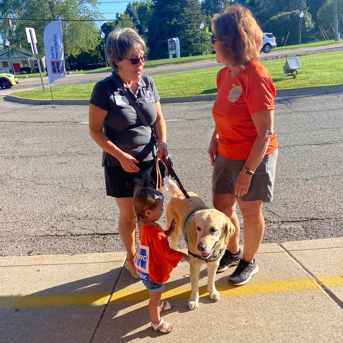 leader dog meeting peach festival runners